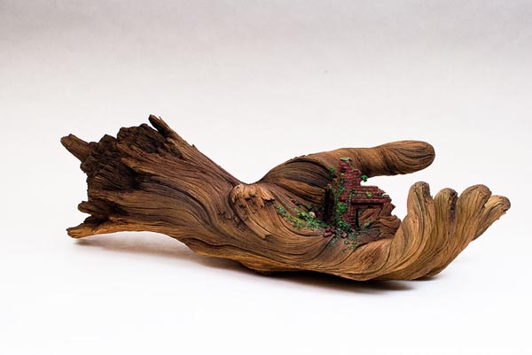Cycle of Decay - ceramic hand sculpture looks like a tree branch