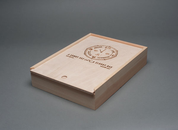 A Sunny day on a Cloudy day - the box