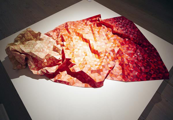Blanket made of soft & flexible wood pieces by German textile designer Elisa Stotzyk