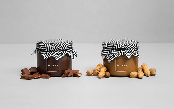 Xoclad Brand Identity by Anagrama