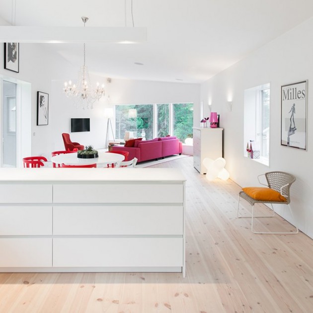 The interior design is significantly characterized by bright colors along with a contrasting red.