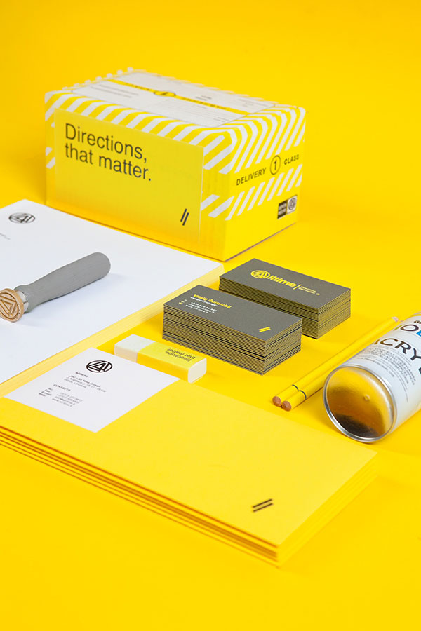Corporate identity design based on yellow, grey and white colors.