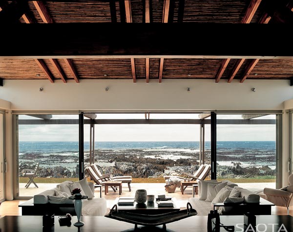 The living area with the terrace to the front facing the ocean.