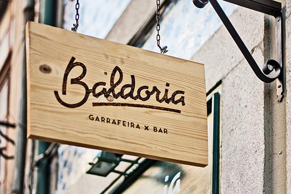 Wooden signage with custom typography.