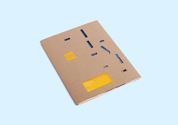 Closed brochure with cut-out cover.