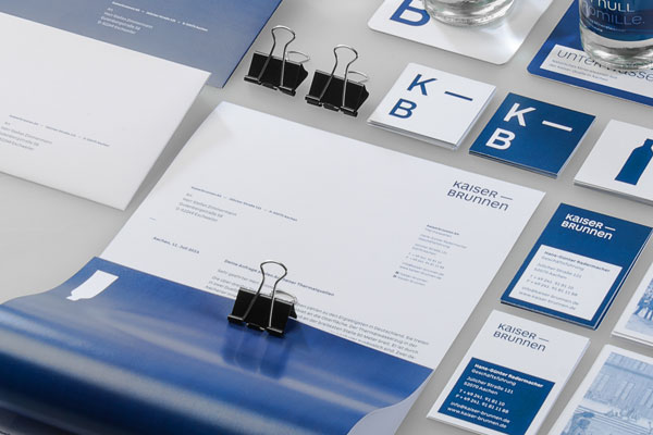Close up of the stationery set and diverse printed matters.