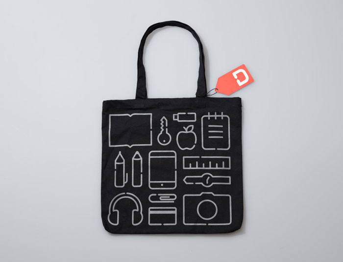 Black bag printed with several icons. Black bag printed with several icons.