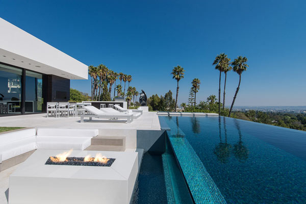 Patio and pool invite to relax and enjoy life.