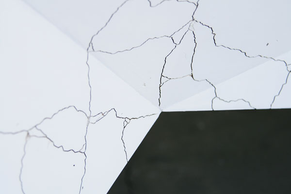 Close up of the fine cracks in the surface.