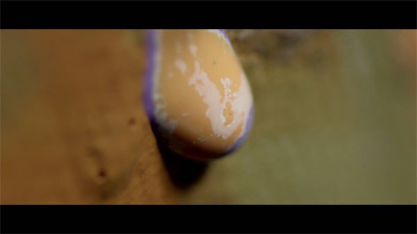 Macro - Detailed view of paint running down the canvas.
