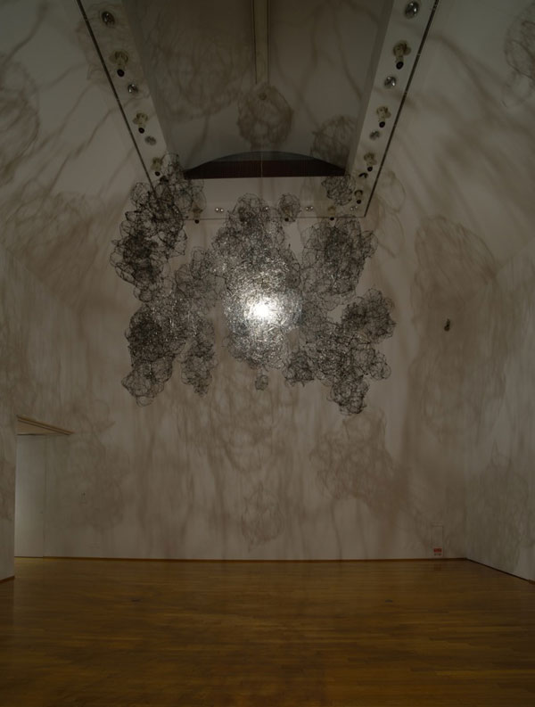 Sculptural art created with wire structures and dripped black glue.
