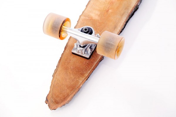 The axes are bolted directly to a piece of wood.