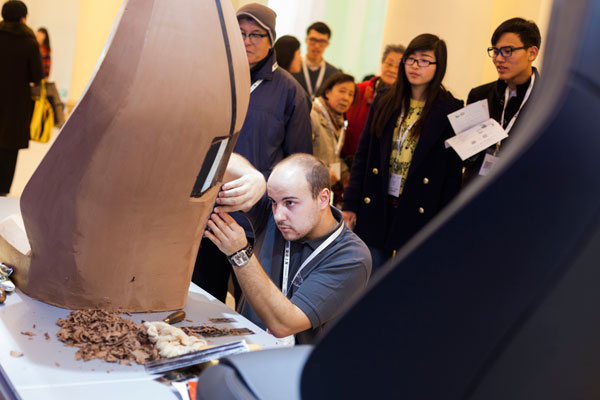 Visitors can look over the designer's shoulder.
