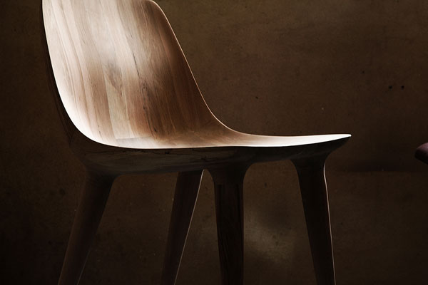 This beautiful piece of hand carved furniture was created of beech wood.
