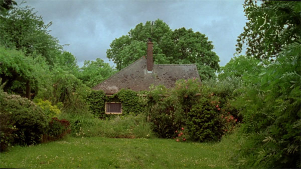 He follows an old man to an old dilapidated house.