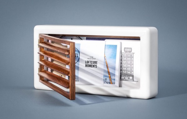 The tiny box includes a range of printed collateral with information and images of the Loft Cube.