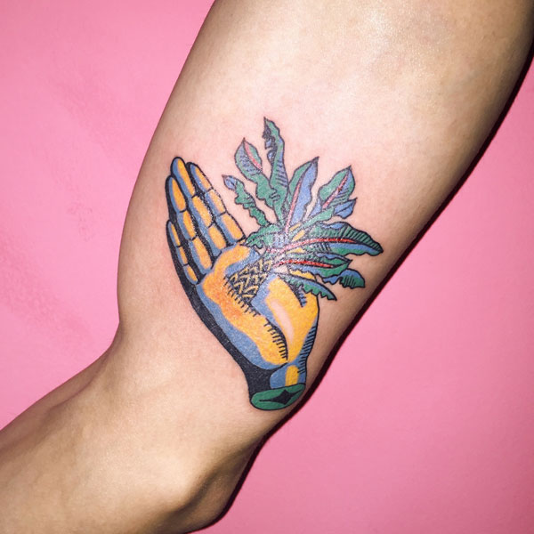 A surreal artwork on the inside of the upper arm.