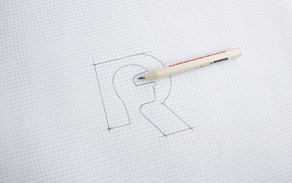 A pencil sketch of the logo. A pencil sketch of the logo.