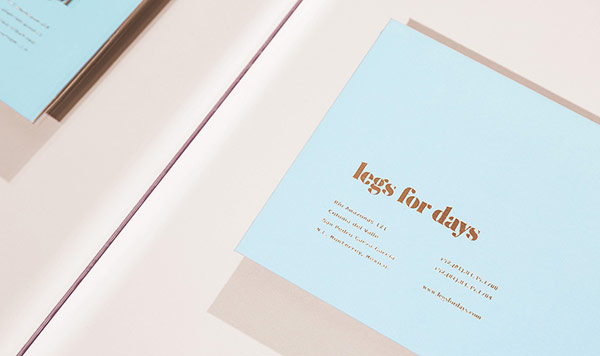 The logotype was printed with a golden color on the light blue background.