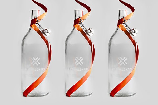 Some water bottles with logo print on the front.