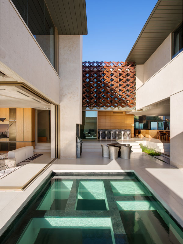 The residence provides open transitions from interior to exterior space.