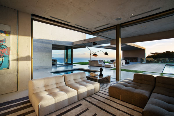 The family room is characterized by plenty of open space as well as cozy and modern interior design.