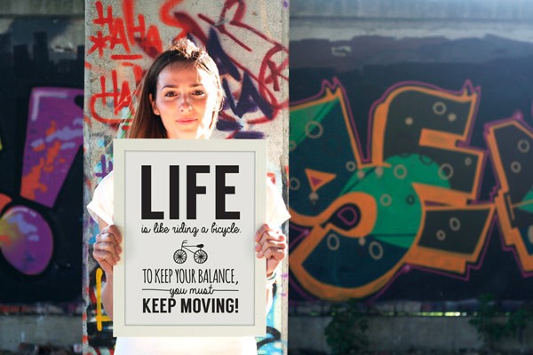Life is like riding a bicycle. To keep your balance, you must keep moving.