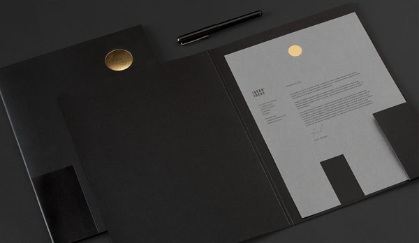 These printed items are part of the stationery set.