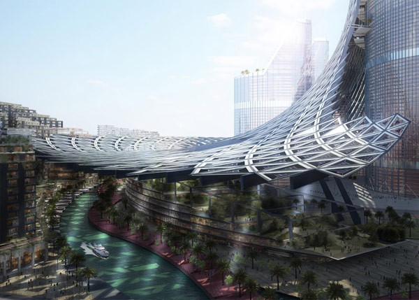 An artificial river flows around the building.