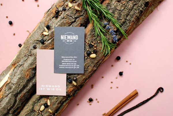 Two-sided business cards with pink and grey backgrounds. Two-sided business cards with pink and grey backgrounds.