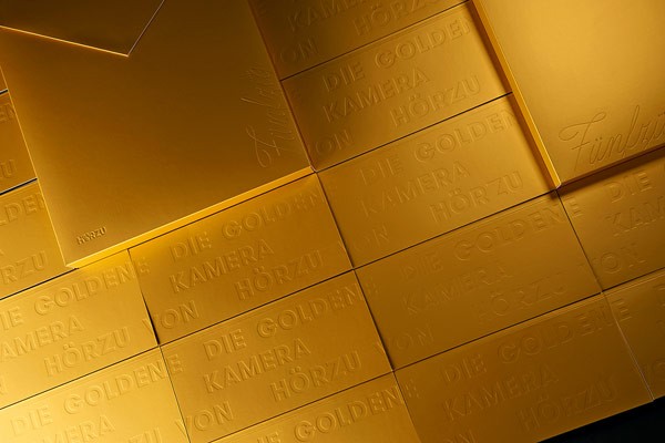 Design studio Paperlux also created a range of golden packaging for the 2015 edition of the annual event.