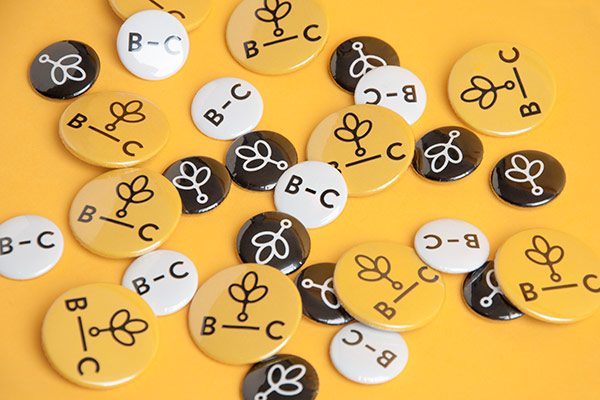 Buttons are part of the set of promotional items.