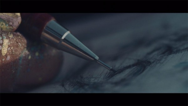 The artists while drawing.
