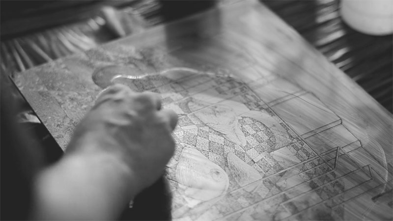 In this process, the plate is cleaned of excess ink.