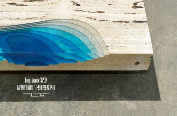 View from top of the table. The deeper the drop the darker the blue color.