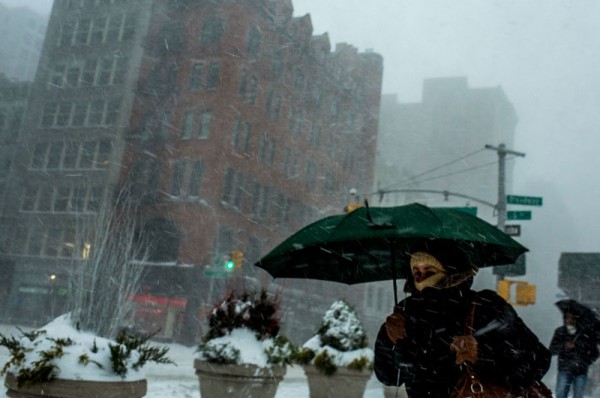 The strong snowfall made it difficult to view or walk the streets.