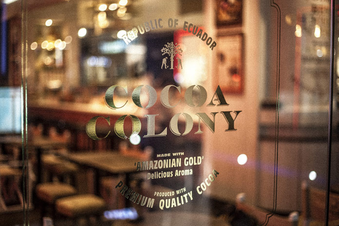 The storefront window with golden lettering.