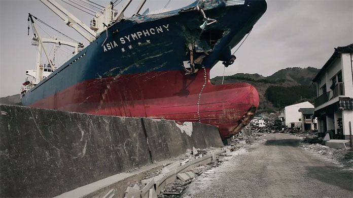 A shipwreck which was washed up on shore by the gigantic tidal wave.