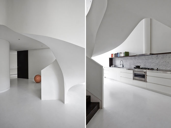 The white curvy shapes create a unique living experience. The white curvy shapes create a unique living experience.