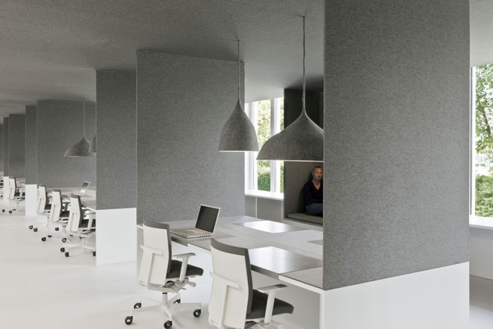 The office workspace is based on a scheme of white and gray areas.