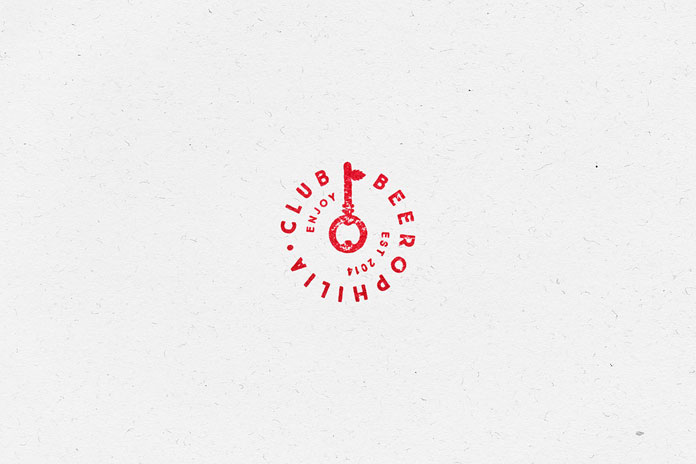 The logo has the symbolic appearance of a stamp.