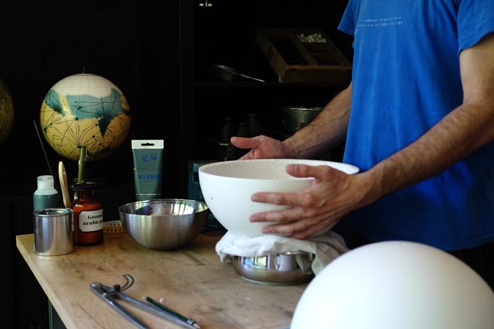 Michael Plichta uses traditional globemaking techniques.