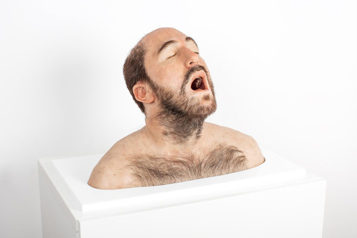 Hyper realistic sculpture of an orgasm.