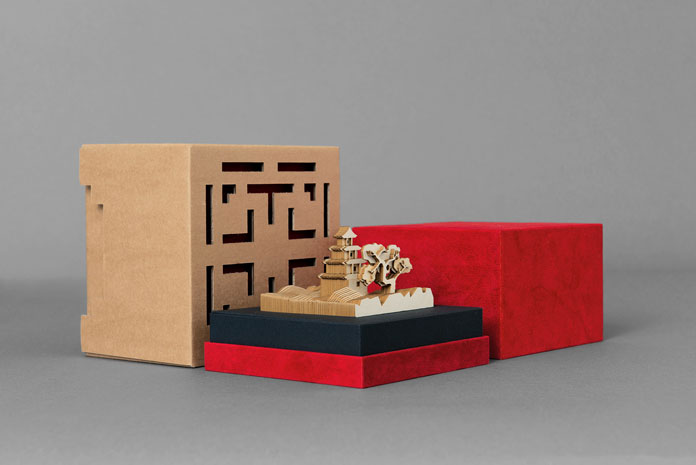 A uniquely cut diorama, made solely out of paper. A uniquely cut diorama, made solely out of paper.