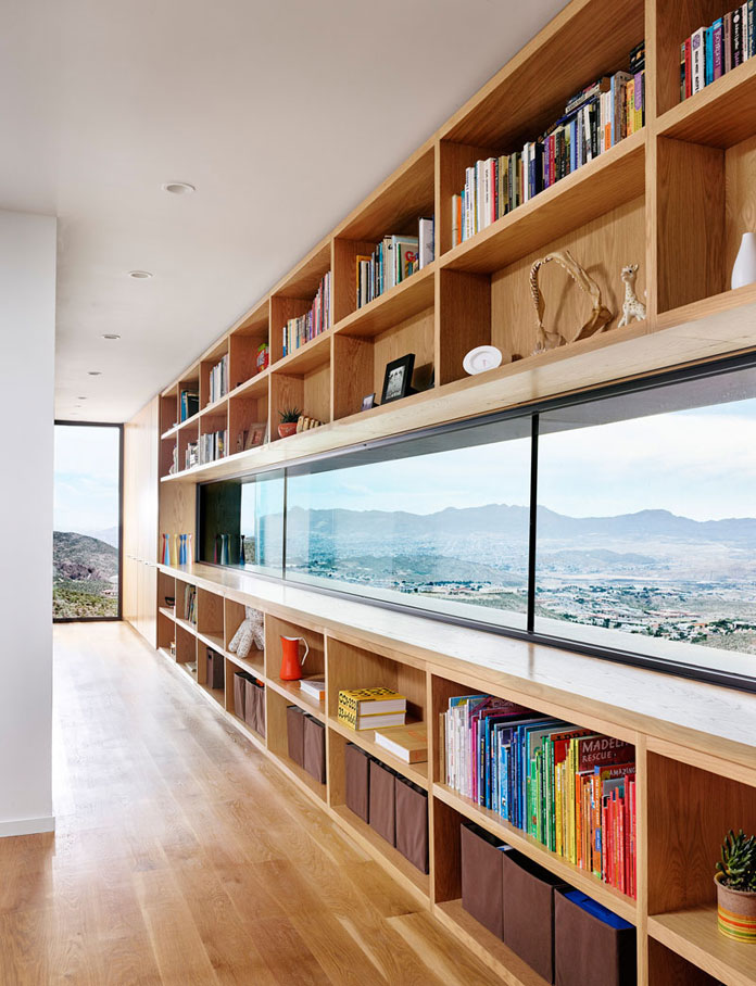 Wood shelf built around a window. Wood shelf built around a window.