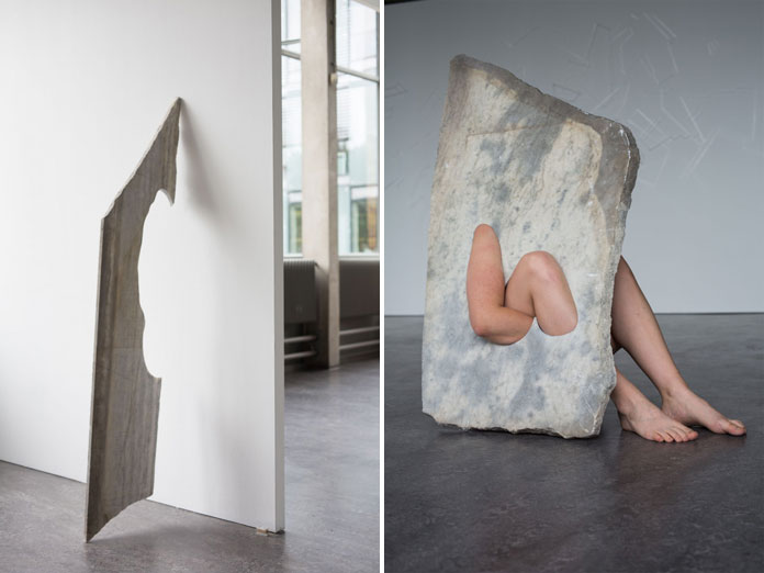 Carved out areas in the stone allow it to create an interaction of her own body with the material.