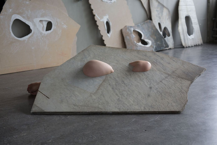 The artist literally becomes part of the sculpture.