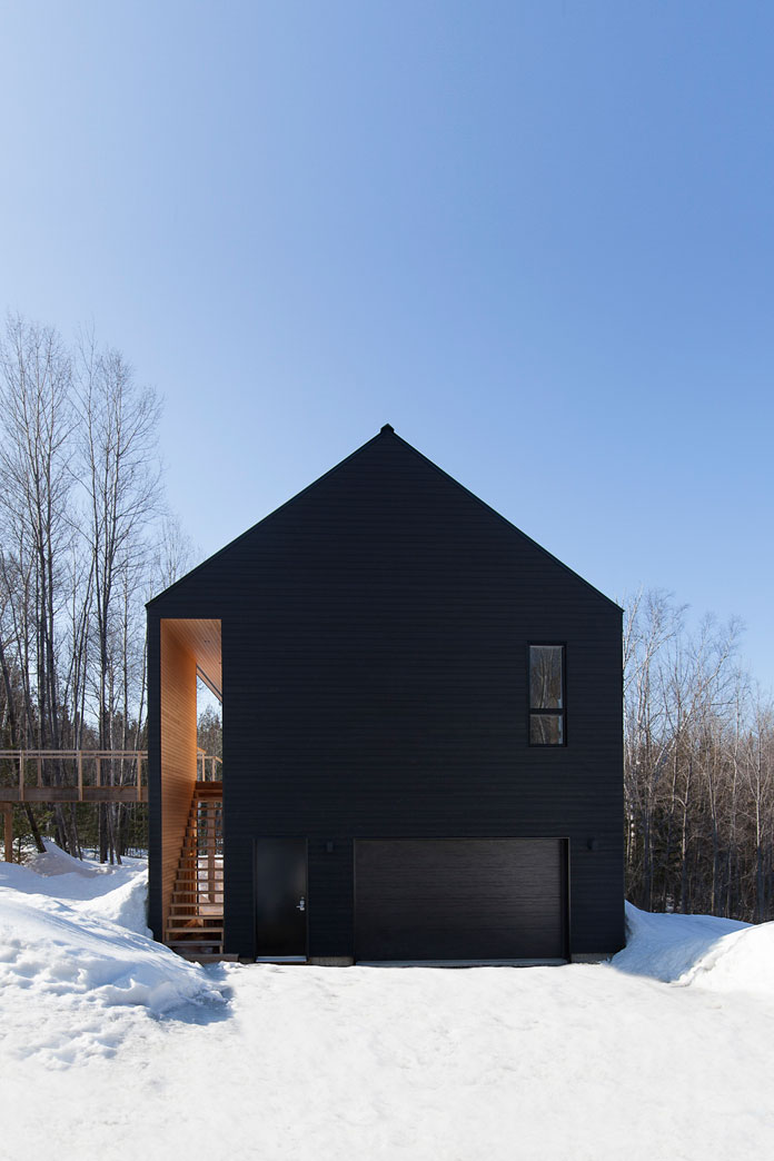 A residential house by DKA Architects built in the Laurentians. A residential house by DKA Architects built in the Laurentians.