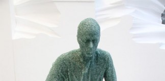 Seated Glass Figure by Daniel Arsham - made of broken glass and resin in 2012