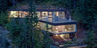 The Khyber Ridge house by Studio (n-1) Architects is distributed along a steep slope.